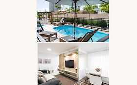 Apartamentos a150 M DA PRAIA com SACADA, WI-FI, PISCINA, PORTARIA 24h, PLAYGROUND e vaga de GARAGEM